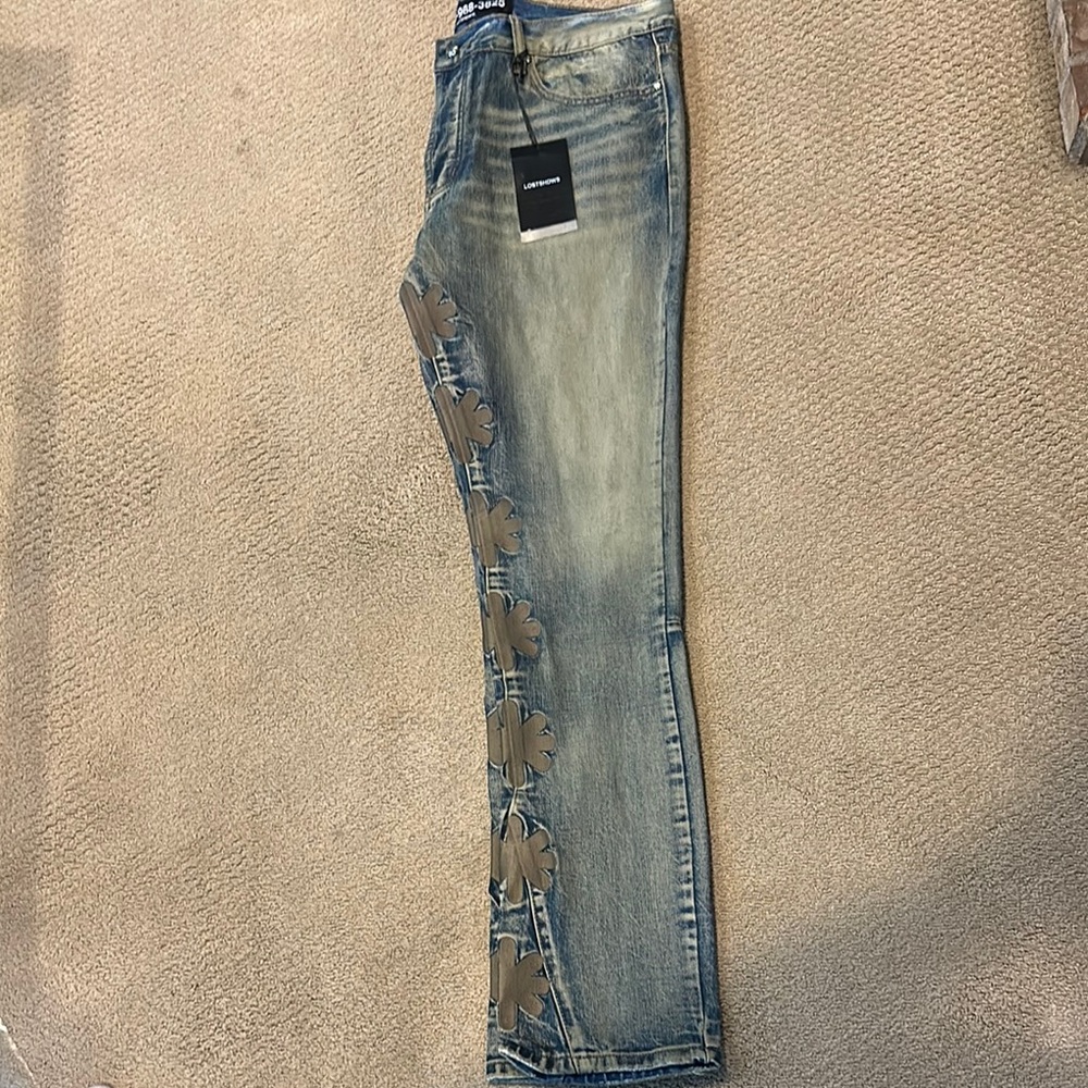 Men's Blue Jeans 
They fit a bit smaller so dont be intimidated by the size!